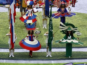 Artists perform before the group A match between Russia and Saudi Arabia which opens the 2018 soccer World Cup at the Luzhniki stadium in Moscow, Russia, Thursday, June 14, 2018.