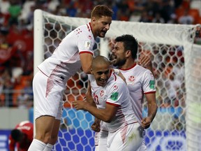 Tunisia's Wahbi Khazri, center, celebrates with his teammates after scoring his side's second goal during the group G match between Panama and Tunisia at the 2018 soccer World Cup at the Mordovia Arena in Saransk, Russia, Thursday, June 28, 2018.