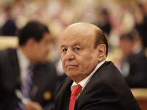 FILE - In this Nov. 10, 2015 file photo, the President of Yemen Abed Rabbo Mansour Hadi, participates in a summit of Arab and South American leaders in Riyadh, Saudi Arabia. Yemen's exiled president was due to visit the United Arab Emirates on Tuesday, June 12, 2018, to patch up relations ahead of an anticipated assault on the rebel-held port of Hodeida. Hadi's trip to Abu Dhabi comes amid months of tensions between his forces and fighters backed by the UAE, which have clashed on a number of occasions.