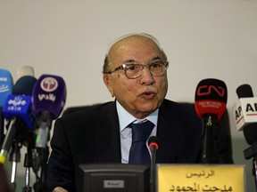 Chief Justice Medhat al-Mahmoud, speaks to journalist in the Supreme Court building in Baghdad, Iraq, Thursday, June 21, 2018. Iraq's Supreme Court on Thursday endorsed a manual recount of all ballots from last month's national elections, but rejected the invalidation of ballots from abroad and from voters displaced by recent conflict. The court ruling concerns a law passed by parliament after widespread allegations of fraud.