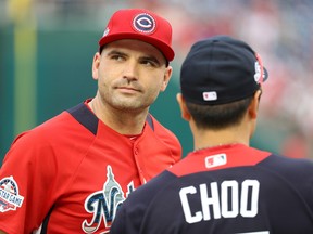 Joey Votto of the Cincinnati Reds looks on during Gatorade All-Star Workout Day at Nationals Parkin Washington on Monday. Carr/Getty Images