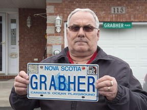 Lorne Grabher displays his personalized licence plate in Dartmouth, N.S. on March 24, 2017.