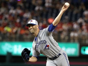 Toronto Blue Jays starter J.A. Happ pitches for the American League in the 10th inning of the MLB all-star game on July 17.