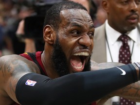 In this May 5 file photo, Cleveland Cavaliers forward LeBron James celebrates his game-winning shot against the Toronto Raptors in Game 3 of their second-round playoff series.