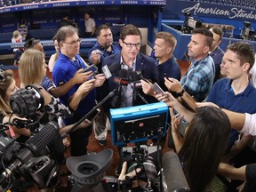 Toronto Blue Jays general manager Ross Atkins speaks to members of the media before a game against the Detroit Tigers on June 29.