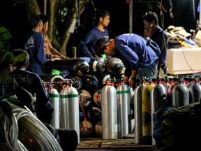 Diving cylinders are prepared at a makeshift camp at the entrance of Tham Luang Nang Non caves for the divers to continue the rescue operation for the 12 trapped children and their coach on July 06, 2018 in Chiang Rai, Thailand.