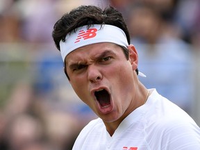 Milos Raonic celebrates his win over Mackenzie McDonald at Wimbledon on July 9.