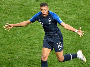 France forward Kylian Mbappe celebrates after scoring a goal during the Russia 2018 World Cup final football match between France and Croatia at the Luzhniki Stadium in Moscow on July 15, 2018.