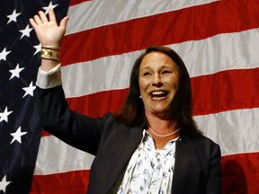 Alabama Rep. Martha Roby waves to supporters during the watch party as she wins the runoff election, Tuesday, July 17, 2018, in Montgomery, Ala. Roby won Alabama's Republican runoff on Tuesday, fighting through lingering fallout from her years-old criticism of then-candidate Donald Trump in a midterm contest that hinged on loyalty to the GOP president..