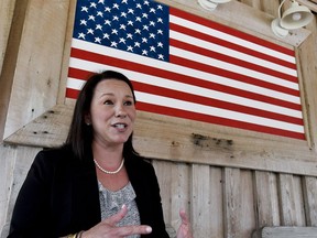 FILE - In this May 30, 2018, file photo, U.S. Rep. Martha Roby, of Alabama, campaigns at a fish fry in Andalusia, Ala. Roby drew a backlash for criticizing Donald Trump two years ago. Now she's trying to fend off primary challenger Bobby Bright with Trump's help, in the July 17 runoff. Bright represented the district for two years as a Democrat, but is running as a Republican and charges Roby with not being sufficiently conservative.