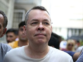 Andrew Craig Brunson, an evangelical pastor from Black Mountain, North Carolina, arrives at his house in Izmir, Turkey, Wednesday, July 25, 2018 An American pastor who had been jailed in Turkey for more than one and a half years on terror and espionage charges was released Wednesday and will be put under house arrest as his trial continues. Andrew Craig Brunson, 50, an evangelical pastor originally from Black Mountain, North Carolina, was let out of jail to serve home detention because of "health problems," Turkey's official Anadolu news agency said.