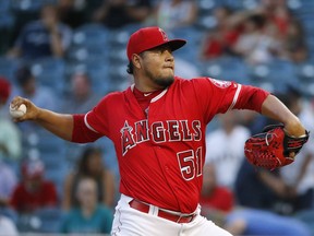 Los Angeles Angels starting pitcher Jaime Barria throws against the Seattle Mariners during the first inning of a baseball game Wednesday, July 11, 2018, in Anaheim, Calif.