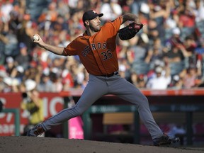 Houston Astros starting pitcher Justin Verlander throws to the plate during the fifth inning of a baseball game against the Los Angeles Angels, Saturday, July 21, 2018, in Anaheim, Calif.