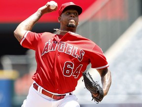 Los Angeles Angels starting pitcher Felix Pena delivers to a Seattle Mariners batter during the first inning of a baseball game in Anaheim, Calif., Sunday, July 29, 2018.