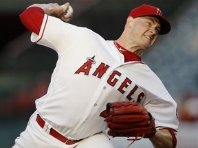 Los Angeles Angels starting pitcher Garrett Richards delivers against an Seattle Mariners batter during the first inning of a baseball game in Anaheim, Calif., Tuesday, July 10, 2018.