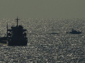 Israeli military naval vessels patrol off the southern Israeli port city of Ashdod, Sunday, July 29, 2018. Israel's military said it intercepted a ship carrying activists en route to Gaza in the latest attempt to break a blockade on the coastal territory. It said the ship is being taken Sunday to an Israeli port. The Freedom Flotilla Coalition said there are activists from 14 countries on the ship carrying medical aid for Gaza.