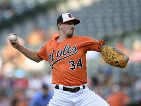 Baltimore Orioles starting pitcher Kevin Gausman delivers during the first inning of a baseball game against the Tampa Bay Rays, Saturday, July 28, 2018, in Baltimore.