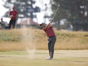 Martin Kaymer of Germany plays a shot on the 9th hole during the first round of the British Open Golf Championship in Carnoustie, Scotland, Thursday July 19, 2018.