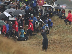 Tiger Woods of the US plays out of the rough on the 2nd hole during the second round of the British Open Golf Championship in Carnoustie, Scotland, Friday July 20, 2018.