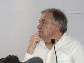 U.N. Secretary General Antonio Guterres gestures as he addresses a press conference with World Bank President Jim Yong Kim at the Kutupalong refugee camp in Cox's Bazar district, Bangladesh, Monday, June 2, 2018. Guterres said Monday that he heard "unimaginable accounts of killing and rape" from Rohingya refugees who have fled from Myanmar to Bangladesh since last August to escape violence. (AP Photo)