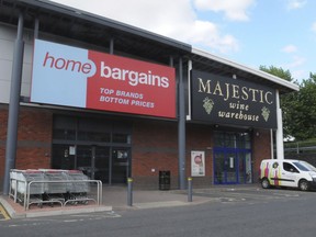 A general view of the Home Bargains store where a man is accused of an acid attack on a young boy, in Worcester, England, Sunday, July 22, 2018. British police say a 3-year-old boy suffered severe burns on his face and arm during a suspected acid attack that investigators think was deliberate. West Mercia police Chief Superintendent Mark Travis said police are working to identify the substance that burned the child on Saturday at a discount store in Worcester, England.