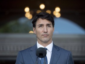 Prime Minister Justin Trudeau speaks during a press conference following a swearing in ceremony at Rideau Hall in Ottawa on Wednesday, July 18, 2018.