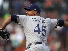 Milwaukee Brewers pitcher Jhoulys Chacin works against the San Francisco Giants in the first inning of a baseball game Saturday, July 28, 2018, in San Francisco.