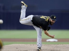 Pittsburgh Pirates starting pitcher Trevor Williams works against a San Diego Padres batter during the first inning of a baseball game Saturday, June 30, 2018, in San Diego.