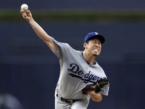 Los Angeles Dodgers starting pitcher Kenta Maeda throws to a San Diego Padres batter during the first inning of a baseball game Wednesday, July 11, 2018, in San Diego.