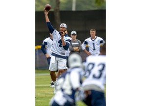 Dallas Cowboys quarterback Dak Prescott throws a pass as he runs the offense during Dallas Cowboys' NFL football training camp, Thursday, July 26, 2018, in Oxnard, Calif.