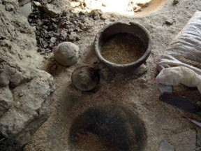 This undated photos provide by the Egyptian Ministry of Antiquities, shows a 4000-year old pottery manufacturing workshop that was recently discovered close to the Nile River in Aswan province, southern Egypt. A statement Thursday July 19, 2018, by the Antiquities Ministry said the workshop, the oldest pottery workshop in the Old Kingdom, belongs to the 4th Dynasty, from 2,613 to 2,494 B.C. (Egyptian Ministry of Antiquities via AP)