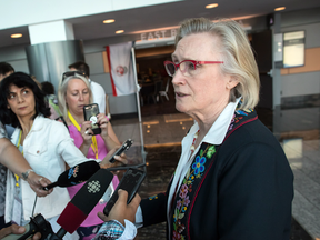 Minister of Crown-Indigenous Relations Carolyn Bennett speaks with reporters before addressing the Assembly of First Nations annual general meeting, in Vancouver on July 26, 2018.