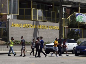 In this Friday, July 13, 2018 photo, Animo Westside Charter Middle School is seen during a summer session to introduce new students to the school they will attend in the fall, in the Playa Del Rey area of Los Angeles. Animo is one of many schools to benefit from donations by billionaires that are influencing state education policy by giving money to state-level charter support organizations to sustain, defend and expand the charter schools movement across the country.