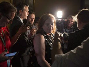Ontario MPP Lisa Macleod turns away after scrumming with reporters at the Ontario Legislature, in Toronto on Thursday, July 5, 2018.