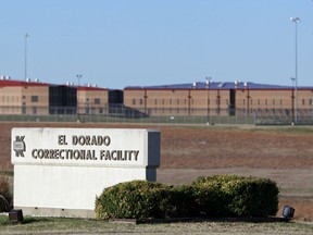 FILE - This March 23, 2011, file photo shows the El Dorado Correctional Facility near El Dorado, Kan. Officials say a group of inmates have surrendered after starting fires inside the prison during a disturbance Sunday, July 1, 2018. No injuries were reported.