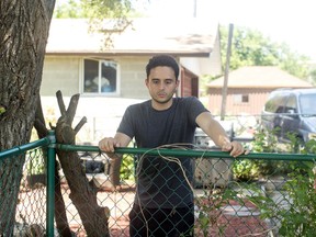 Juan Gomez, 29, a political activist who fled Colombia with his wife and child, is pictured in Toronto on Tuesday, July 10, 2018.