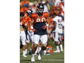 Denver Broncos tight end Jake Butt takes part in drills at the team's NFL football training camp Tuesday, July 31, 2018, in Englewood, Colo.