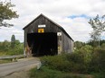 McGuire Bridge, seen in Elmsville, N.B., in an undated handout photo, is one of two covered bridges which are closed as a result of flood damage.