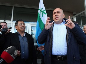 The NunatuKavut community in southern Labrador is entering talks with the Canadian government to negotiate Indigenous rights and self determination, as Ottawa moves formally recognize the Inuit group. Todd Russell, President of NunatuKavut talks to the media at a demonstration on the steps of the Confederation Building in St. John's on Tuesday, Oct. 25, 2016. Johannes Lampe, left, President of Nunasiavut, looks on.