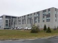 The federal Liberals are struggling to find a way to properly compensate civil servants who have suffered financially and emotionally as a result of the failed Phoenix pay system, says a government source. The centralized Public Service Pay Centre is shown in Miramichi, N.B., on Friday, May 4, 2018.