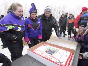 The family of one of 16 people killed in a crash involving the Humboldt Broncos bus has filed a lawsuit. Humboldt Broncos' Adam Herold's father Russell, mother Raelene and sister Erin prepare to blow out the 17 candles on his cake as family and friends celebrate what would have been Adam's 17th birthday in Montmartre, Sask., on Thursday, April 12, 2018. Russell and Raelene Herold filed the statement of claim on behalf of their son, Adam.