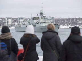 Family and friends look on as HMCS St. John's heads to the Mediterranean Sea for a deployment with NATO forces, in Halifax on Tuesday, Jan.16, 2018. HMCS St. John's is expected to return to its home port of Halifax, N.S. on Monday after a six-month deployment in the Baltic Sea, Northern Atlantic Ocean, and the Mediterranean Sea.