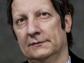 Canadian playwright, actor, film director and stage director Robert Lepage, of Quebec City, speaks to reporters at the National Arts Centre in Ottawa on November 10, 2010. Quebec playwright and stage director Robert Lepage is weighing in on the cancellation of his controversial SLAV show, criticized because it featured a white woman singing songs composed by black slaves.Robert Lepage says he won't wade into the issue of cultural appropriation, but says in a lengthy statement the discourse that led to the cancellation of the show earlier this week was a direct blow to artistic freedom.