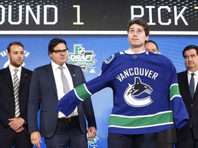 The Vancouver Canucks are showing off their future stars this week, as the team's prospects take part in development camp. Defenceman Quinn Hughes in a Canuck's jersey for the first time Tuesday, weeks after the team selected the 18-year-old seventh overall at the NHL draft. Hughes dons a Vancouver Canucks jersey after the Canucks selected him during the NHL hockey draft in Dallas, Texas, Friday, June 22, 2018.