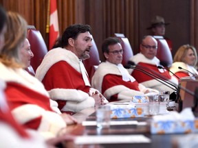 Supreme Court of Canada chief justice Richard Wagner speaks during the welcoming ceremony for Justice Sheilah Martin, in Ottawa on Friday, March 23, 2018. Wagner, the chair of the Canadian Judicial Council, says that social context education provides judges with necessary skills to ensure "myths" and "stereotypes" do not influence judicial decisions, on the website.