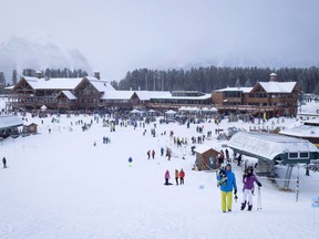 A Canadian environmental group is warning a United Nations body about the possible impact of hosting Winter Olympic events in Banff National Park. Skiers leave the resort after a power failure shut down all operations at the women's World Cup downhill ski race at Lake Louise, Alta., Saturday, Dec. 2, 2017.