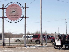 A sign welcomes visitors at the Attawapiskat airport in the remote northern Ontario community on Monday, April 18, 2016.The chief of Attawapiskat First Nation has launched a personal war on illegal drugs because he says he is tired of waiting for others to deal with a problem that is destroying his small community in Northern Ontario.