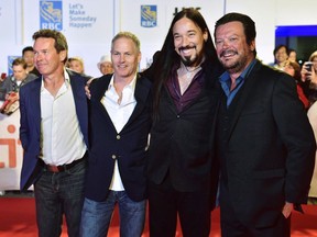 The Tragically Hip, from left, Gord Sinclair, Johnny Fay, Rob Baker and Paul Langlois arrive on the red carpet for the movie "Long Time Running" during the 2017 Toronto International Film Festival in Toronto on Wednesday, September 13, 2017. A line of cannabis strains backed by members of the Tragically Hip will carry names familiar to many of the band's fans. Up Cannabis investor, and Hip bassist Gord Sinclair, says the company plans to market five strains, each making a subtle nod to the Hip's most popular songs.THE CANADIAN PRESS/Frank Gunn