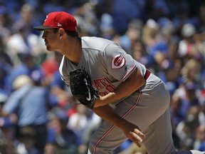 Cincinnati Reds starting pitcher Tyler Mahle throws against the Chicago Cubs during the first inning of a baseball game Friday, July 6, 2018, in Chicago.