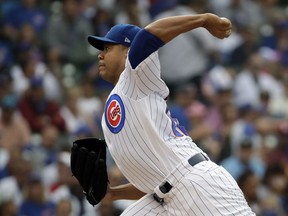 Chicago Cubs starting pitcher Jose Quintana throws against the St. Louis Cardinals during the first inning of a baseball game Sunday, July 22, 2018, in Chicago.